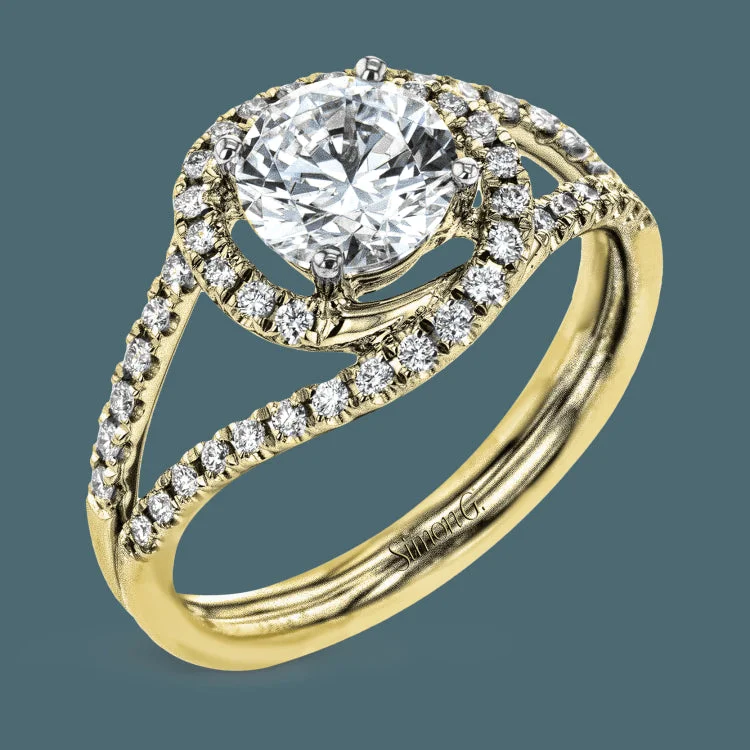 Women’s gold three-stone engagement rings-Crafted in the highest quality platinum, this engagement ring design features a two overlapping loops encircling the center stone set with .25 ctw of white diamonds.