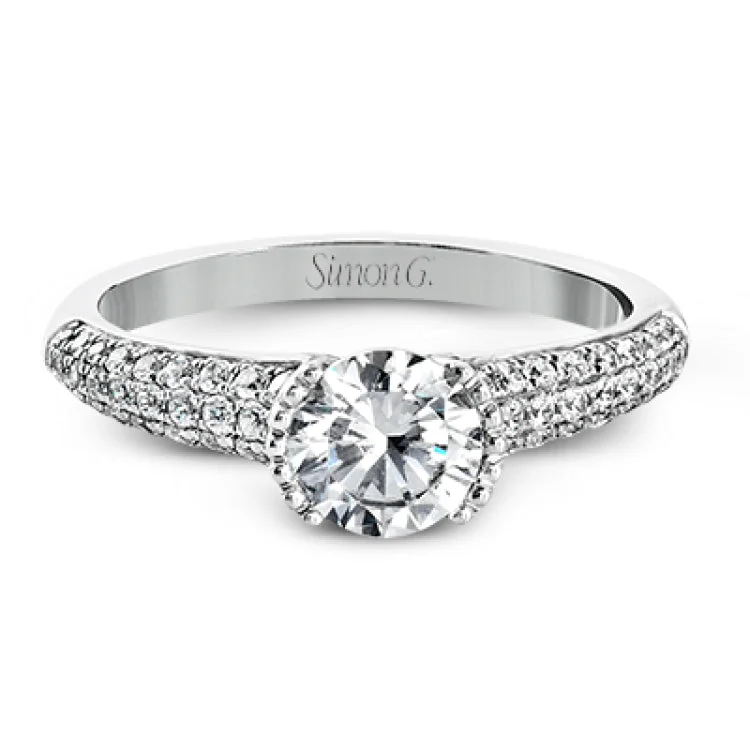 Women’s unique moissanite engagement rings-A modern take on a classic design, this white gold engagement ring is accented by .35 ctw of round cut white diamonds.