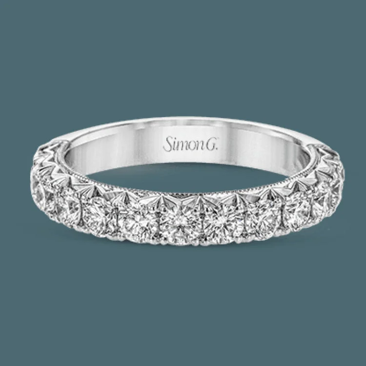 Women’s forever one engagement rings-This classic wedding band features a distinctive setting style that shows off the .97 ctw of white diamonds to their full advantage.